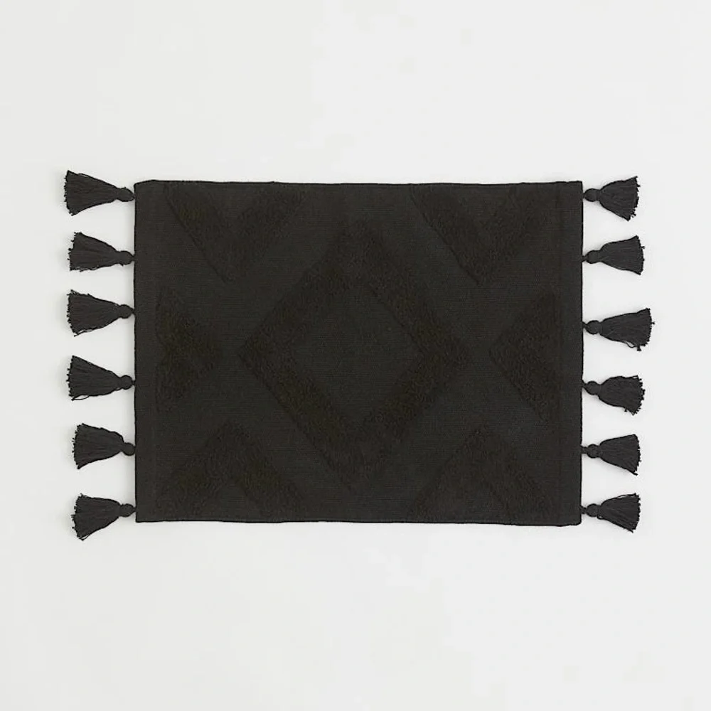 New H&M Home Black Tasselled bath mat Size: 18X24.